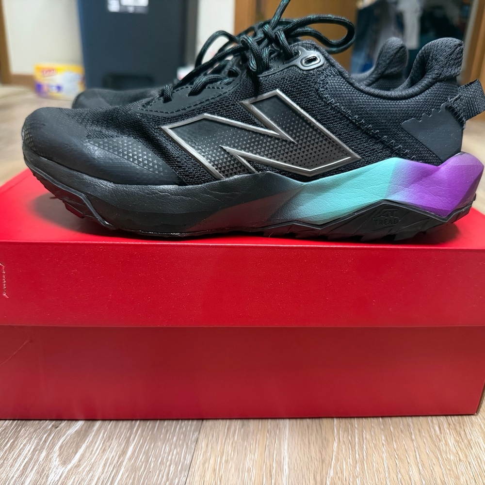 New Balance Black Sneakers with Purple and Blue Accents